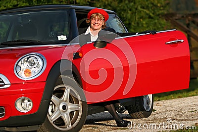 Senior in sports car Stock Photo