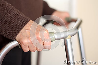 Senior using a walker Stock Photo