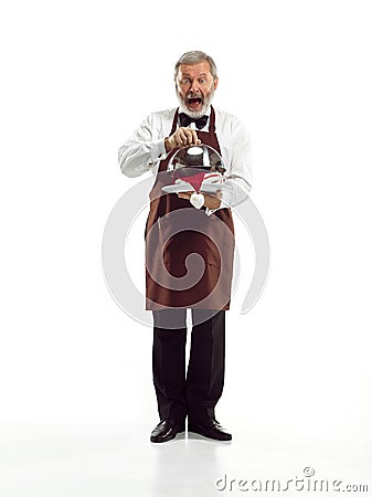 Senior waiter at studio Stock Photo