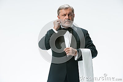 Senior waiter with white towel. Sign language in the restaurant Stock Photo
