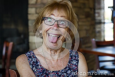 Senior Woman Acting Silly Stock Photo