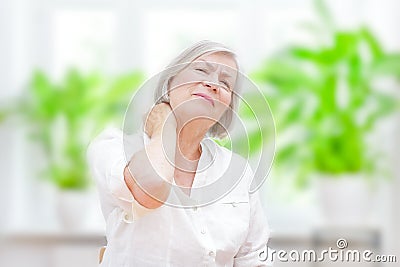 Senior woman acute neck pain Stock Photo