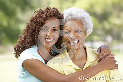 Senior Woman With Adult Daughter In Park Stock Photo