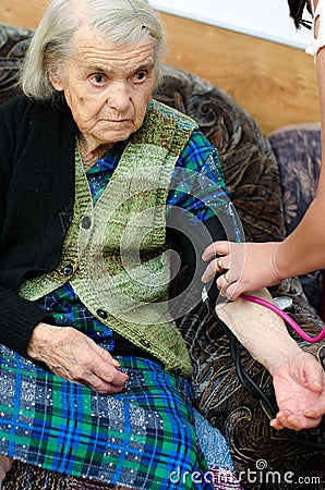 Senior woman blood pressure Stock Photo