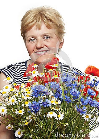 Senior woman with bunch of flowers Stock Photo