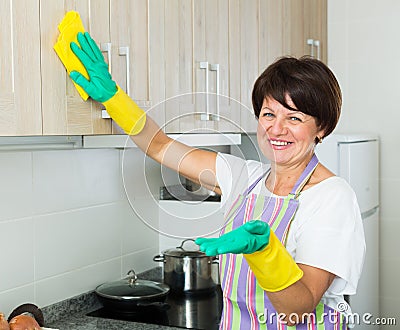 senior woman cleaning Stock Photo