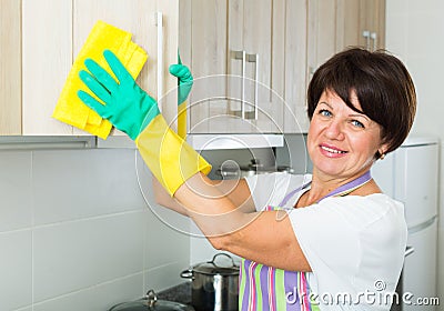 senior woman cleaning Stock Photo