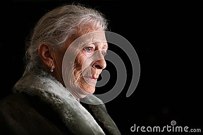 Senior woman contemplating Stock Photo