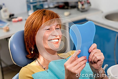 Senior woman in the dental office. Stock Photo