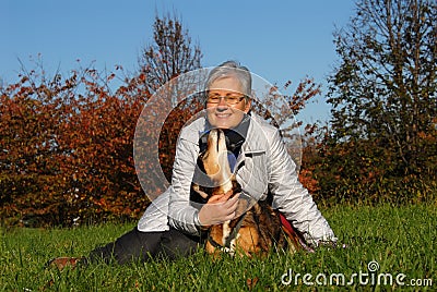 Senior woman with dog Stock Photo