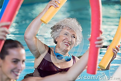 Senior woman doing aqua aerobic Stock Photo