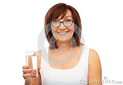 Senior woman in glasses with glass of water Stock Photo