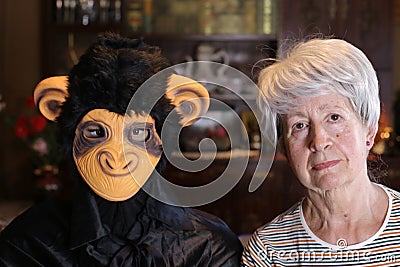 Senior woman with a gorilla Stock Photo