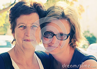 Senior woman and her adult daughter Stock Photo