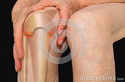 Senior woman holding the knee with pain Stock Photo