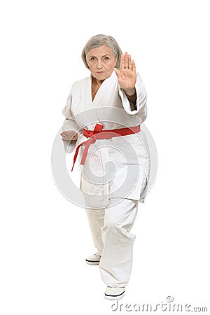 Senior woman in karate pose Stock Photo