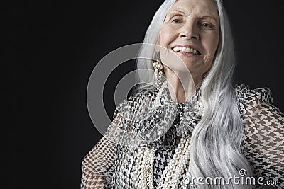 Senior Woman With Long Gray Hair Smiling Stock Photo