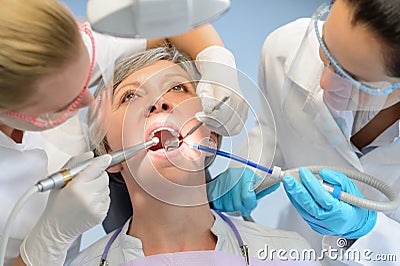 Senior woman patient dental check dentist team Stock Photo