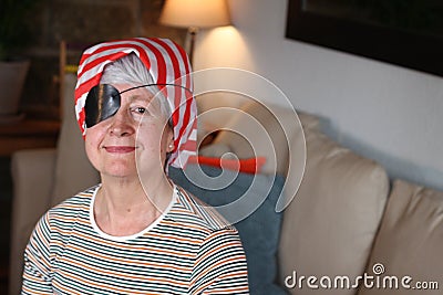 Senior woman with pirate disguise Stock Photo