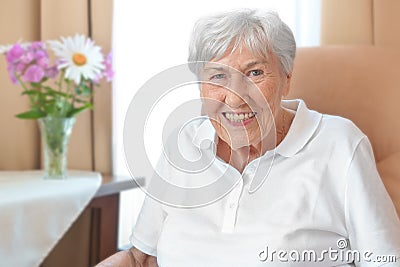 Senior woman stooped posture osteoporosis Stock Photo