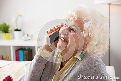 Senior woman talking on the phone Stock Photo