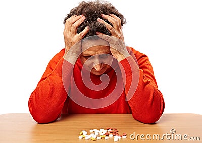 Senior woman with too many pills Stock Photo