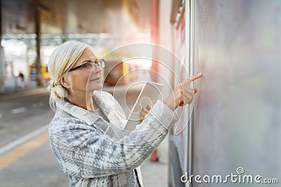 Senior woman using tablet Stock Photo