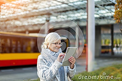 Senior woman using tablet Stock Photo