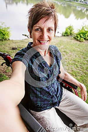 Senior Woman In Wheelchair Stock Photo