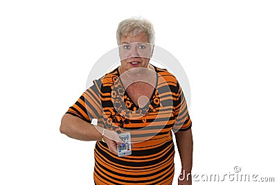 Senior woman zapping with remote control Stock Photo