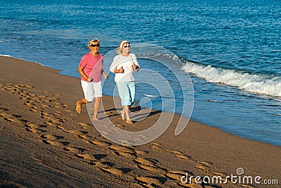 Senior women having early morning jog. Stock Photo