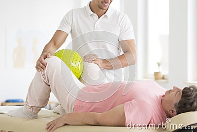 Senior woman during physical rehabilitation Stock Photo