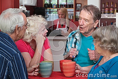 Seniors in Conversation Stock Photo