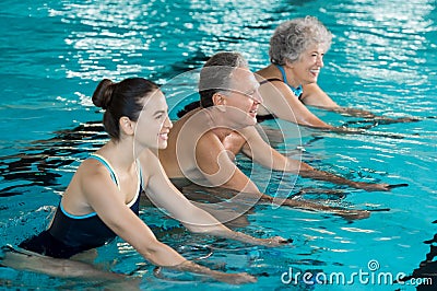 Seniors cycling on aqua bike Stock Photo