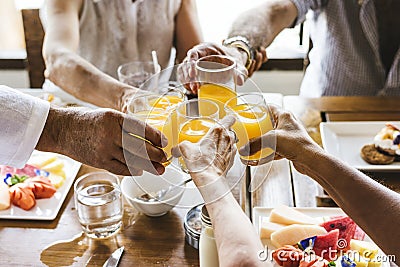 Seniors enjoying breakfast in hotel Stock Photo