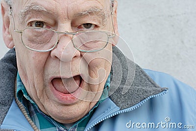 Seniors man with mouth open Stock Photo