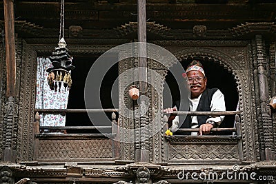 Senoir nepali man looking from window Editorial Stock Photo