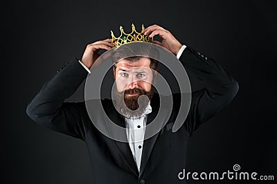 Sense of self importance. Big boss. King crown. Egoist concept. Businessman in tailored tuxedo and crown. Very important Stock Photo