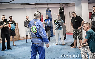 Sensei master instructor Avi Nardia with his students Editorial Stock Photo