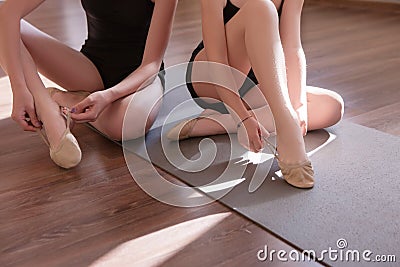 Sensitive females. Young ballerinas lesson Stock Photo