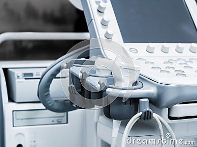 Sensors of ultrasound machine with buttons and monitor. Modern medical equipment. Details. Close-up Stock Photo