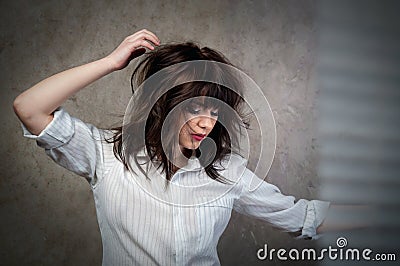 Brunette, girl in a shirt with shades of blinds on the body Stock Photo