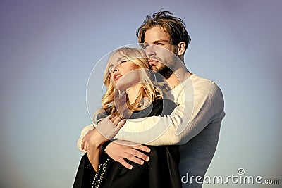 Sensual couple. Muscular man and woman with long blond hair, love. Stock Photo