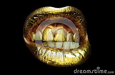 Sensual golden woman lips. Aggressive angry mouth. Womans gold lip. Female mouth close up. Stock Photo