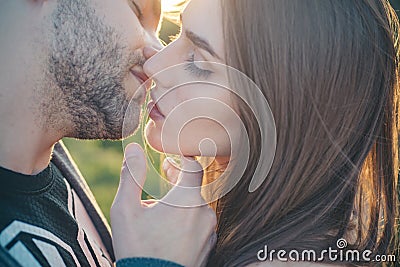 Sensual Kiss. Close-up of beautiful passionate couple kissing. Sexy couple In Love. Intimate relations. Mouths kissing Stock Photo