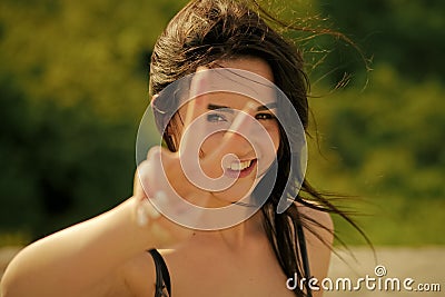 Sensual woman. Woman or girl happy smile with v sign hand gesture Stock Photo