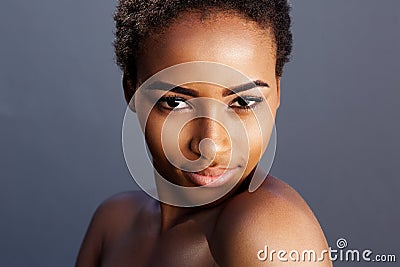 Sensual young african woman against gray background Stock Photo