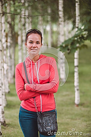 Sensual Young Girl Vaping Hookah shisha sitting on terrace in hotel. Vacation rest. Lifestyle without makeup. Stock Photo