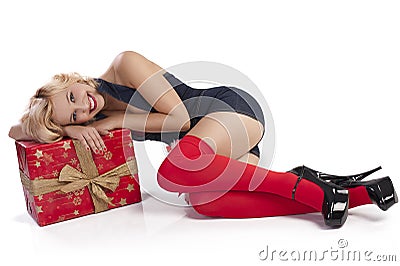 Sensul girl laying with gift box Stock Photo