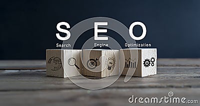 SEO text wooden cube blocks on table background. Idea, Vision, Strategy, Analysis, Keyword and Content concept Stock Photo